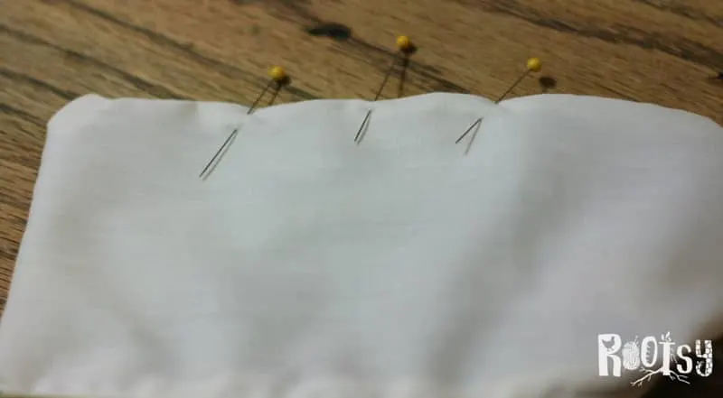 photo of straight pins in making zippered pouches