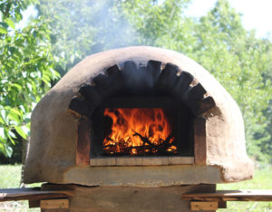 A backyard bread and pizza oven is another wonderful way to cook and bake outdoors | Rootsy