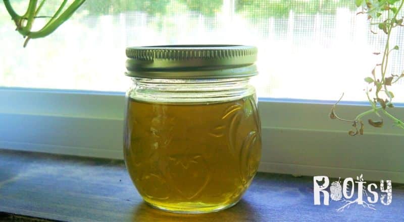 image of plantain infused oil on kitchen window