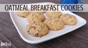 A plate full of cookies with text overlay stating oatmeal breakfast cookies.