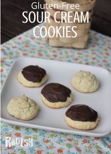 Gluten free sour cream cookies on a square plate.