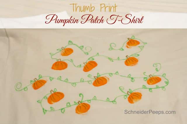 A beige T-shirt adorned with orange pumpkins linked by green vines, perfect for fall crafts enthusiasts. The top features the text "Thumb Print Pumpkin Patch T-Shirt," while "SchneiderPeep.com" graces the lower right corner.