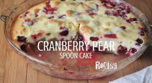 Cranberry pear spoon cake in a glass pie plate with text overlay.