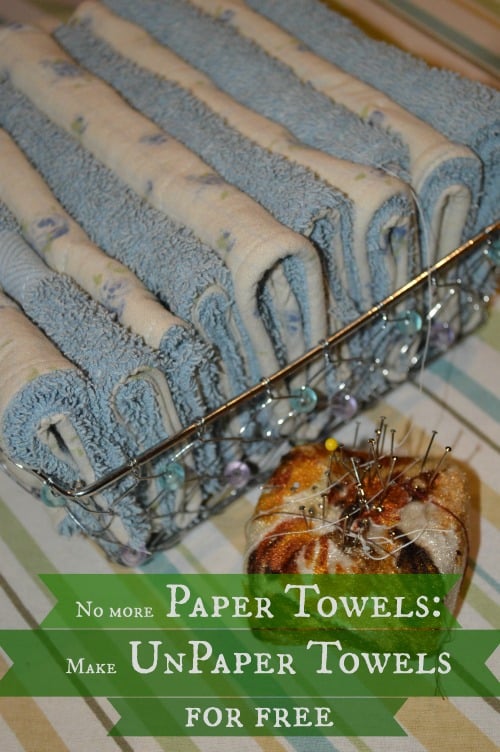 A wire basket holds neatly folded blue and white cloths on a striped surface. A pin cushion with pins is in front. Text reads, "No more paper towels: make unpaper towels for free.