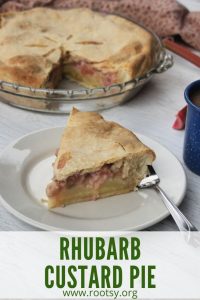 A slice of pie on a white plate with a fork sitting in front of remaining pie in glass dish with text box reading: rhubarb custard pie.