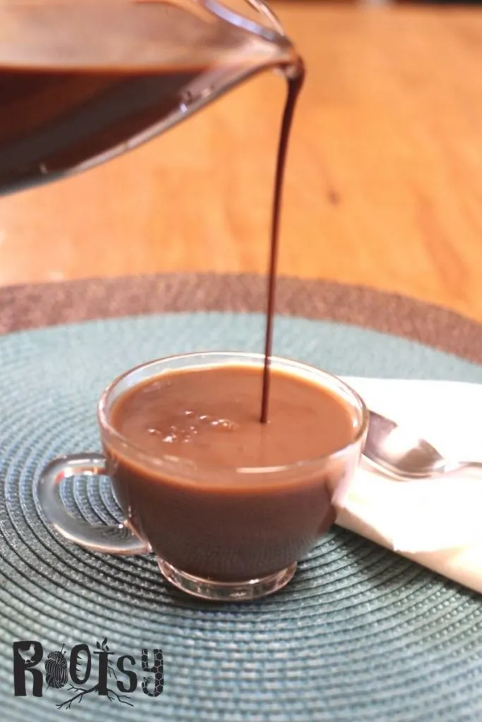 chocolate simple syrup poured into coffee