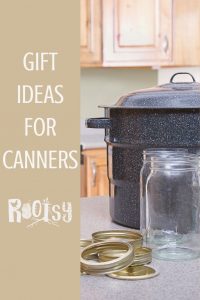 A water bath canner pot with empty glass jars and canning rings on a kitchen counter with text overlay reading gift ideas for canners.