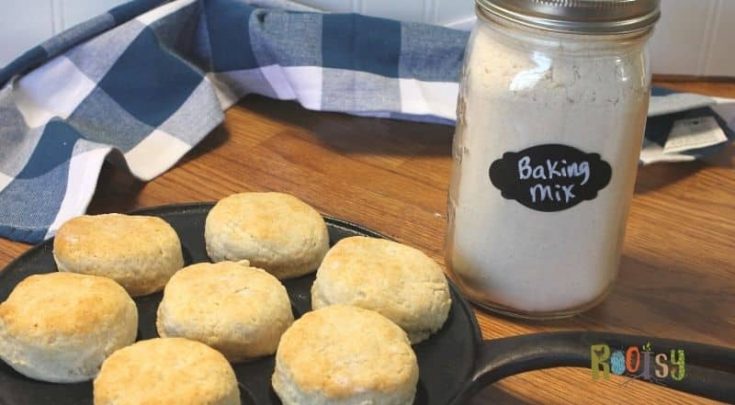 cast iron pan of homemade biscuits and a jar of homemade biscuit baking mix