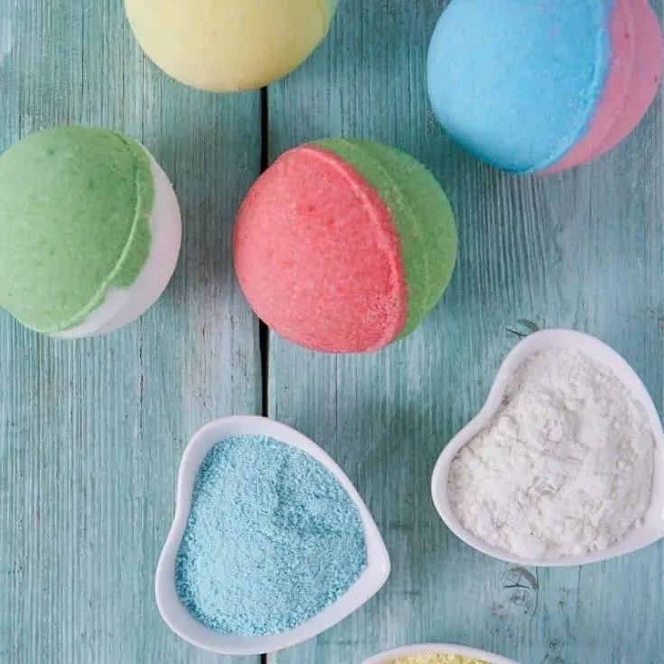 colorful bath bombs for kids on blue background