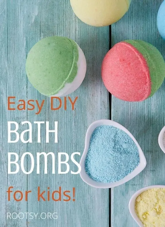 colorful bath bombs for kids on a blue wooden background
