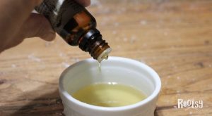 essential oils being added to coconut oil for making bath bombs with kids