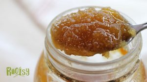 crystallized honey on spoon in mason jar