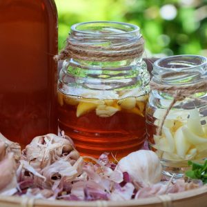 honey and garlic in glass jars