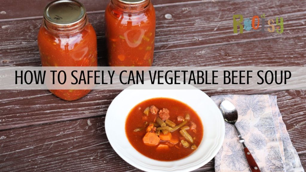 A bowl of soup with a napkin and spoon sitting to the right in the background 2 quart jars full of soup. Text overlay reads: How to Safely Can Vegetable Beef Soup.
