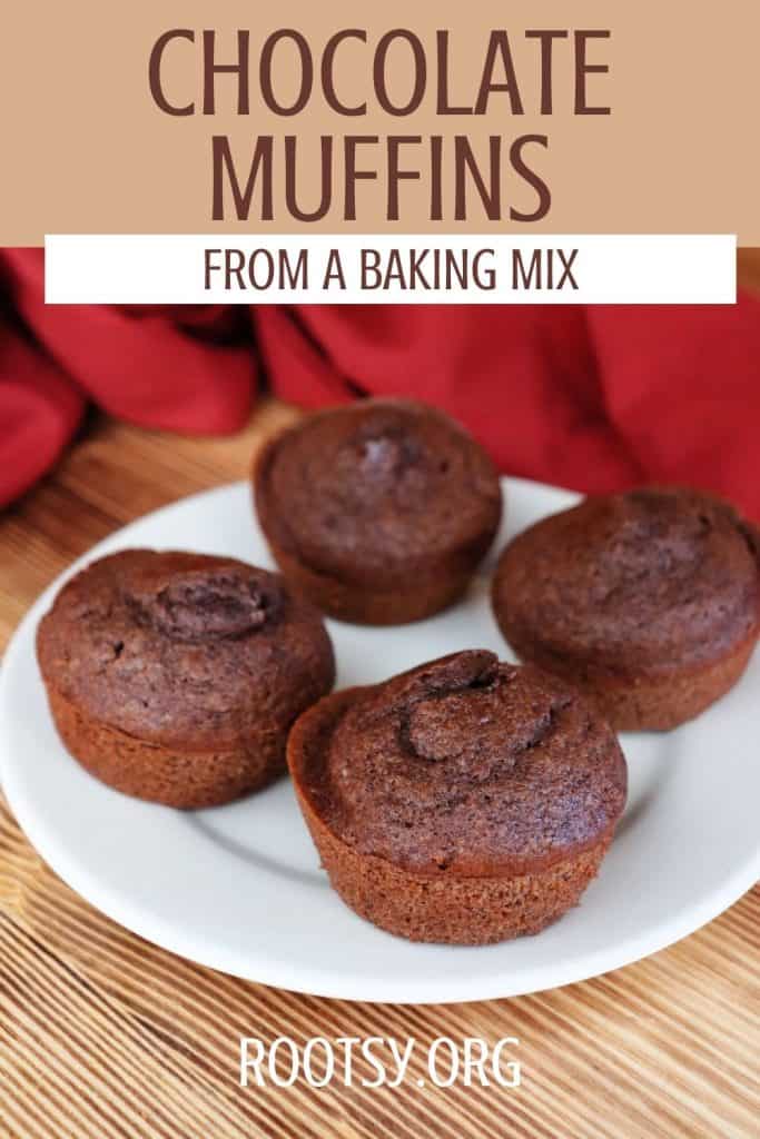 A white plate with four chocolate muffins is on a wooden surface, with a red cloth in the background. Text above the plate reads: "Chocolate Muffins from a Baking Mix. rootsy.org.